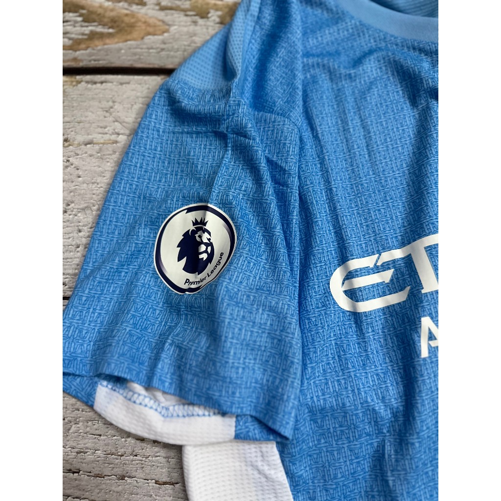 Set bộ bóng đá MC 2021 sân nhà màu xanh quần xẻ tà