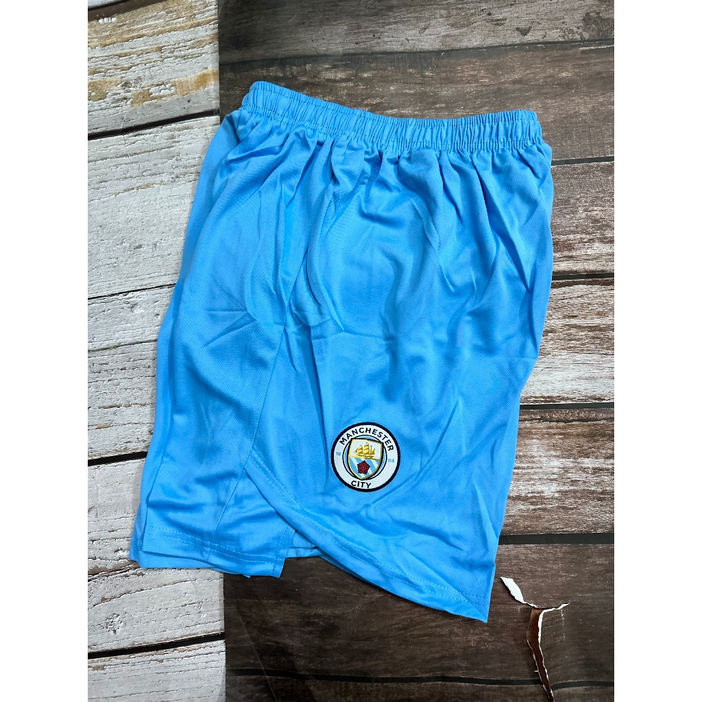 Set bộ bóng đá MC 2021 sân nhà màu xanh quần xẻ tà