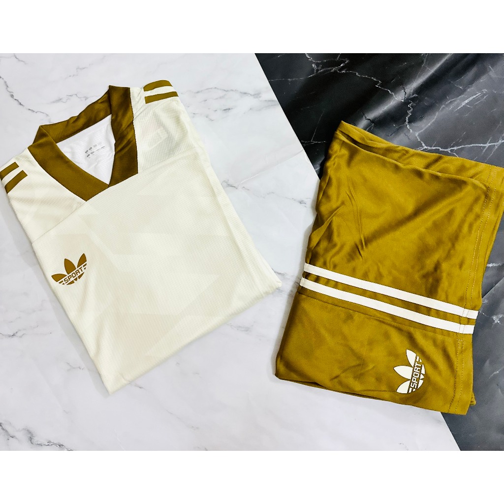 Set bộ quần thể thao nam nữ vải gai thái ba lá áo vàng kem quần vàng đồng có túi 2023