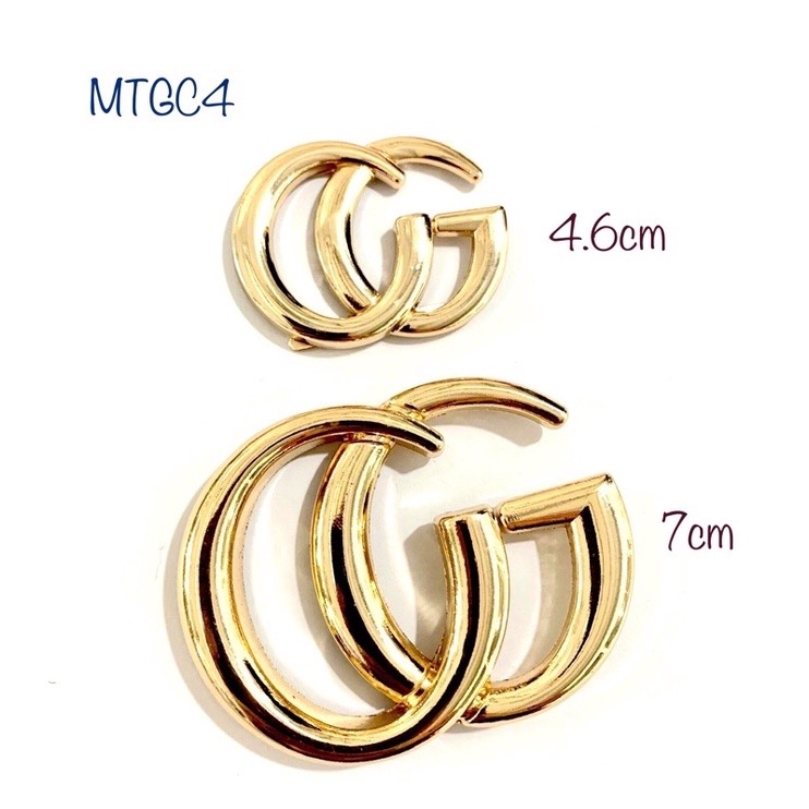 Mác Gucci trang trí túi - ví