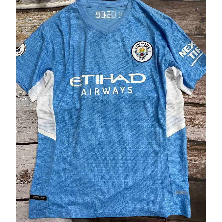 Set bộ bóng đá MC 2021 sân nhà màu xanh quần xẻ tà