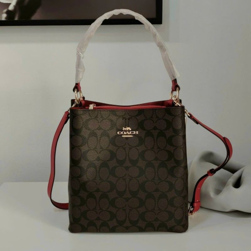 C0ACH BUCKET BAG họa tiết xinh xắn