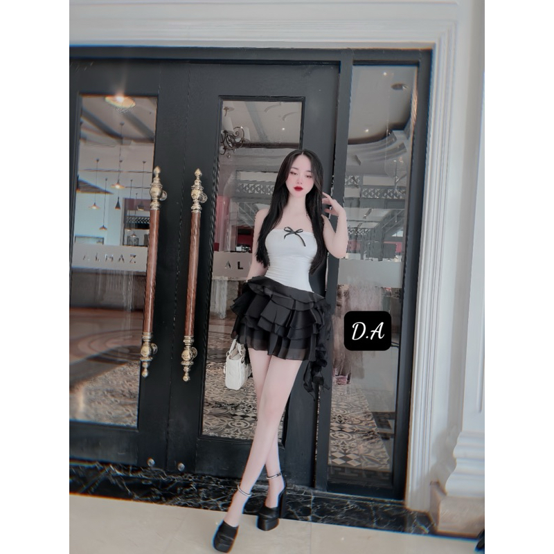 Đầm dáng xoè tầng quây ngực đính nơ