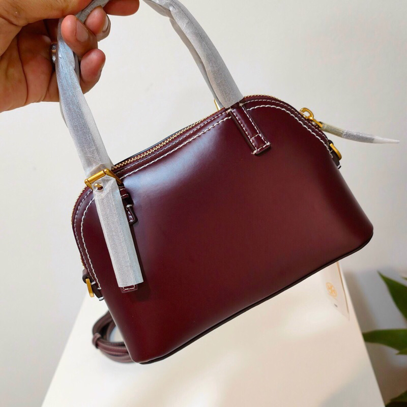 Túi nữ dáng hến da thật siêu sang