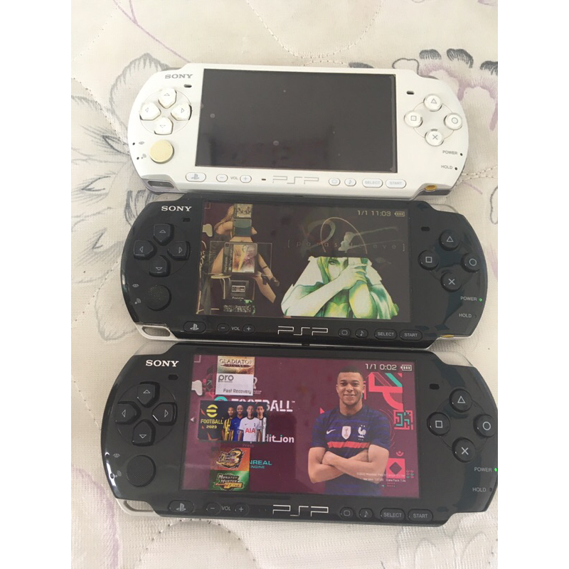 Máy chơi games sony psp3000 kèm thẻ 32g full games hay