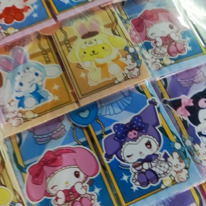 Bìa 20 bộ sticker thay quần áo thỏ tím , băng dính kiểu velcro bóc ra được