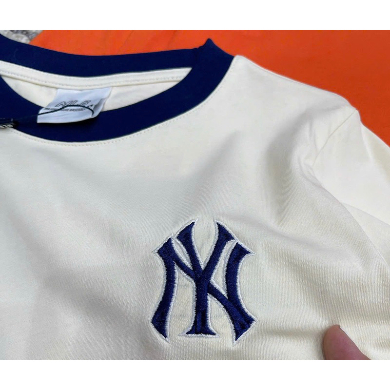 Áo phông tag thêu N..Y chất cotton đẹp mềm mịn. Phom rộng