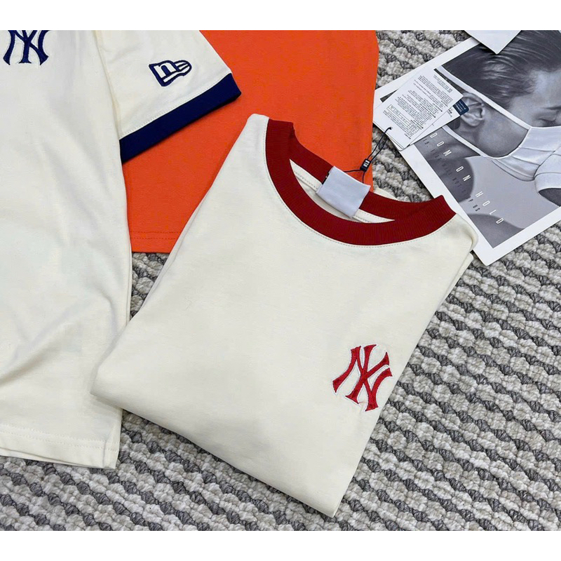 Áo phông tag thêu N..Y chất cotton đẹp mềm mịn. Phom rộng