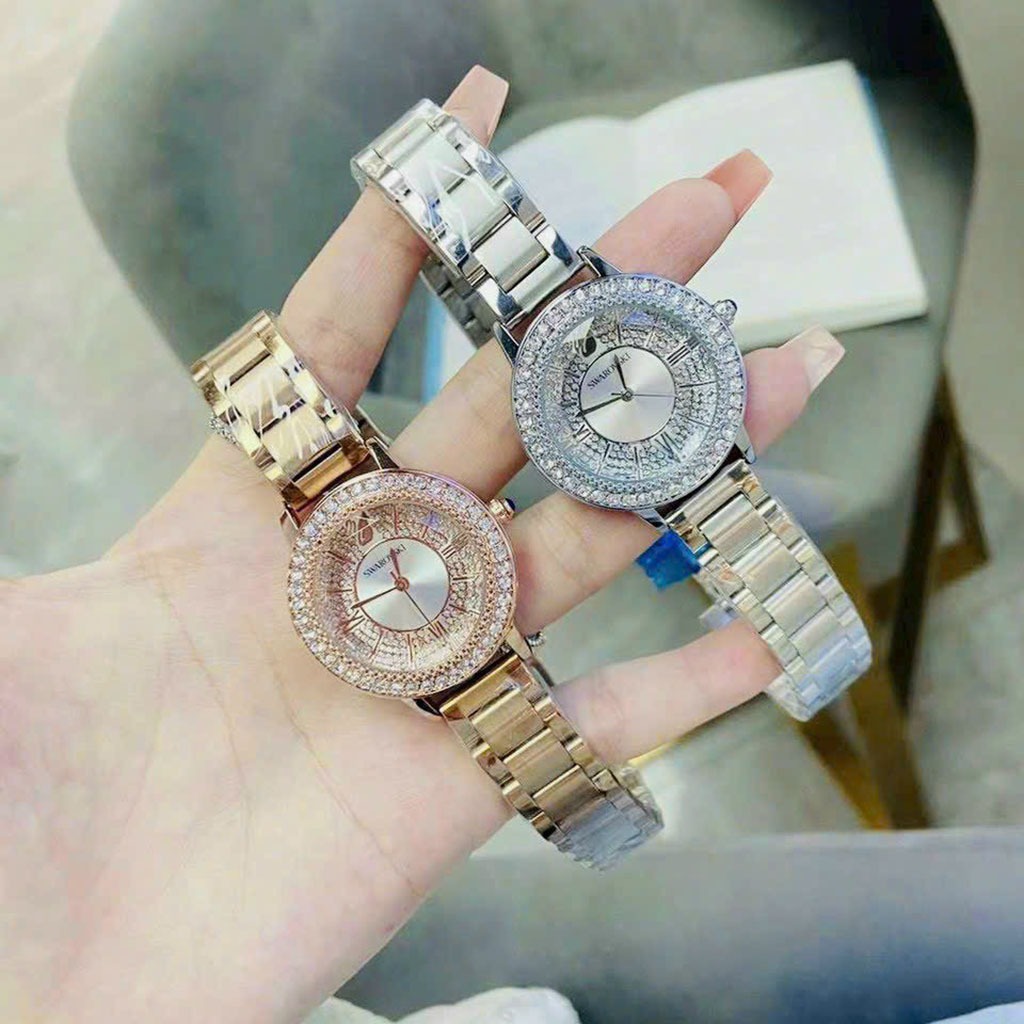 Đồng hồ nam nữ swarovski mặt tròn viền đá dây thép đúc, khóa bấm sang trong cao cấp, chống nước bảo hành 12 tháng