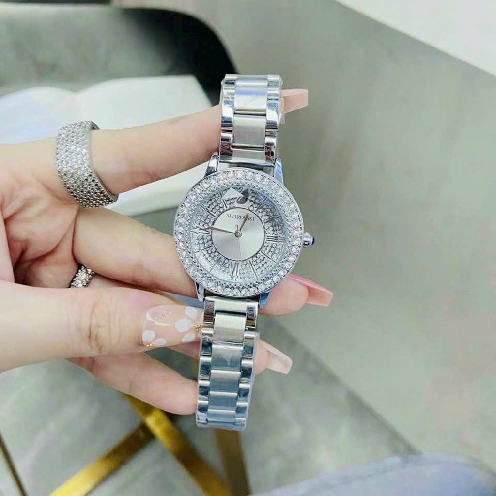 Đồng hồ nam nữ swarovski mặt tròn viền đá dây thép đúc, khóa bấm sang trong cao cấp, chống nước bảo hành 12 tháng