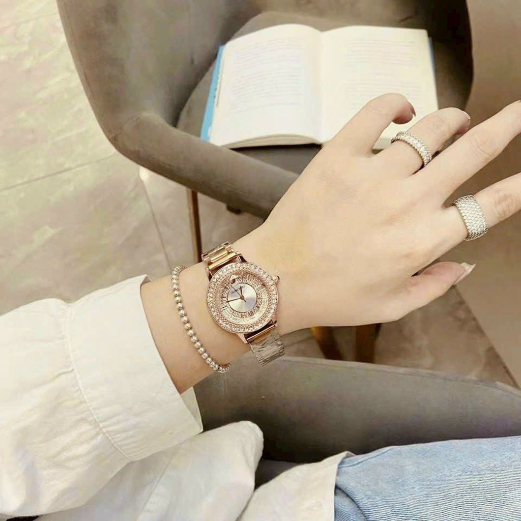 Đồng hồ nam nữ swarovski mặt tròn viền đá dây thép đúc, khóa bấm sang trong cao cấp, chống nước bảo hành 12 tháng