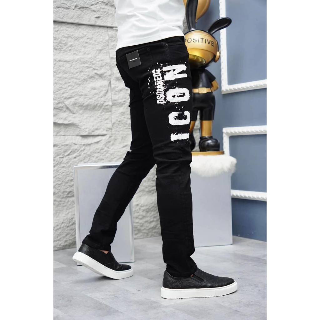Quần jean bò nam Dsq2 đen trơn in sơn chữ ICON trắng dọc viền đùi 4 cúc boy phố đơn giản