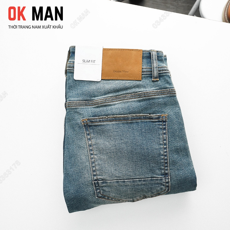Quần jean nam OKMAN ống slimfit màu xanh dơ, co giãn tốt 23679
