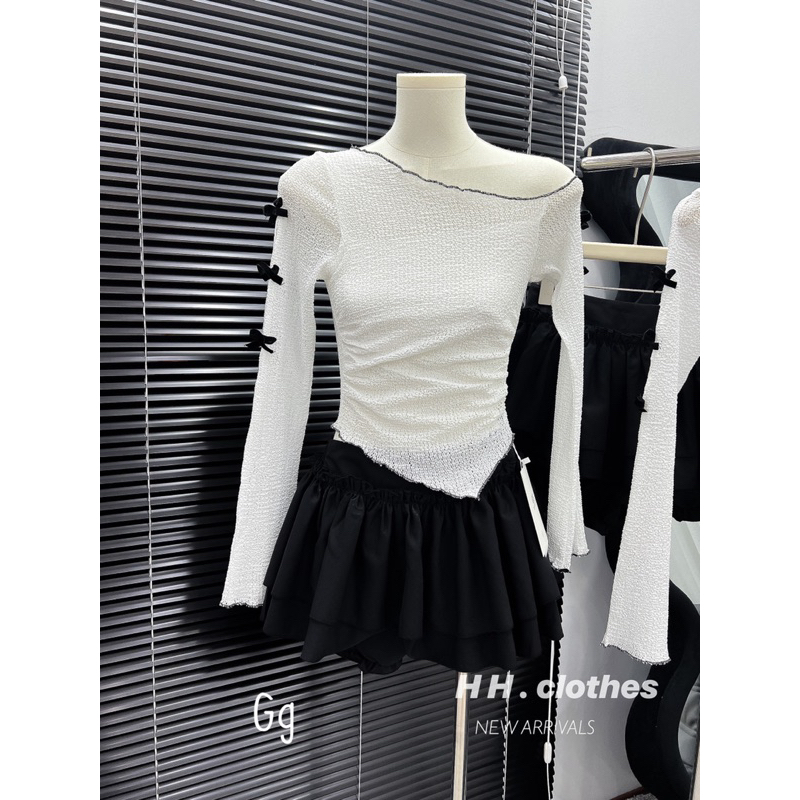 SET ÁO LEN LỆCH VAI ĐÍNH NƠ TAY DÀI VẠT NHỌN PHỐI CHÂN VÁY TẦNG