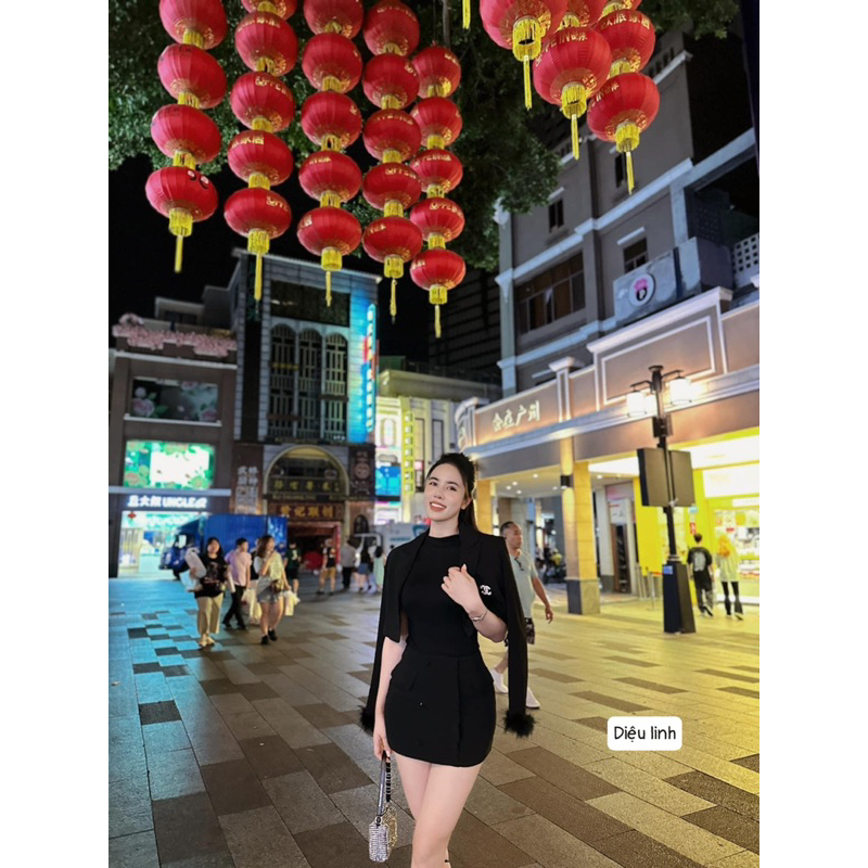 Set áo vest tay lông + chân váy ngắn cúc bọc