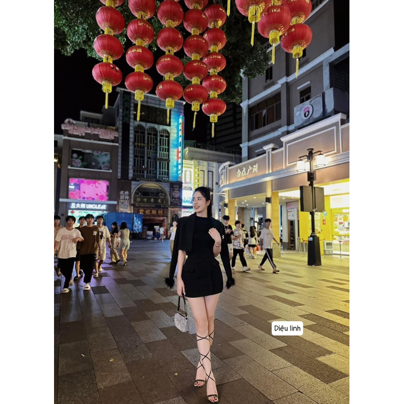 Set áo vest tay lông + chân váy ngắn cúc bọc