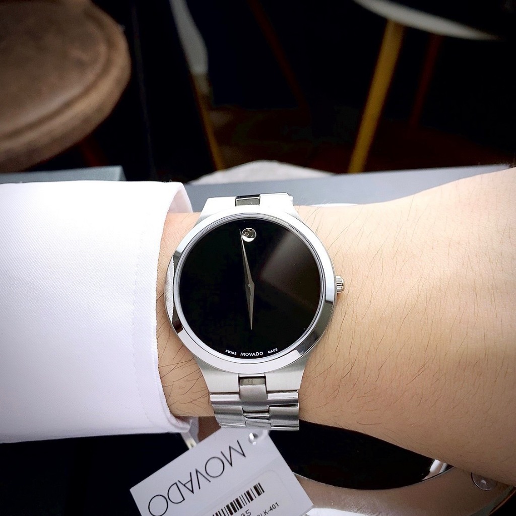 ĐỒNG HỒ CẶP MOVADO 0607199 khung thép trắng- Máy swiss made- Size 40/26mm- chống nước- bảo hành 24 tháng