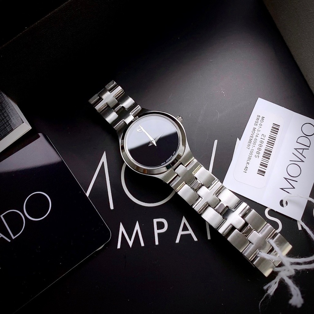 ĐỒNG HỒ NỮ MOVADO 0607199 khung thép trắng- Máy swiss made- Size 26mm- chống nước- bảo hành 24 tháng