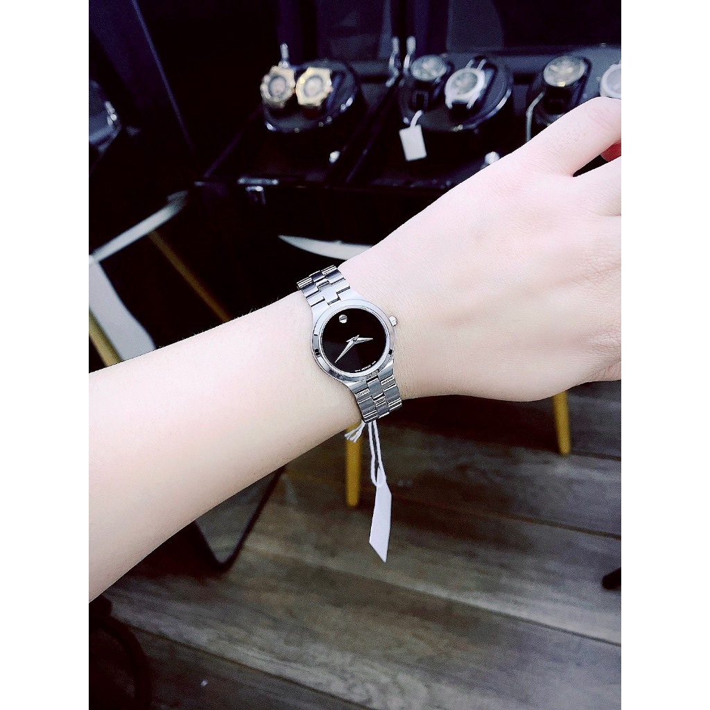 ĐỒNG HỒ NỮ MOVADO 0607199 khung thép trắng- Máy swiss made- Size 26mm- chống nước- bảo hành 24 tháng