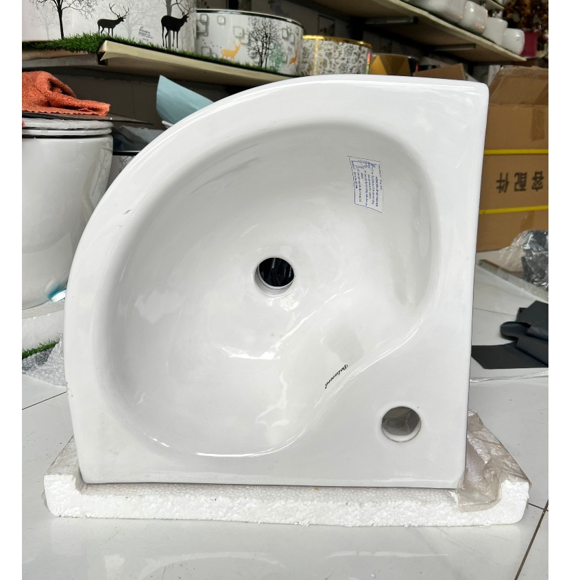 Chậu lavabo góc treo tường