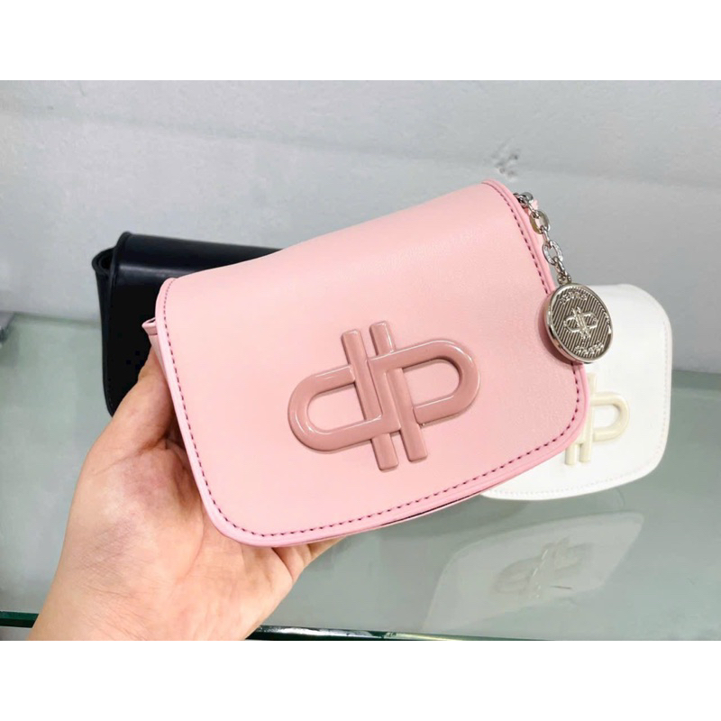 Túi mini, túi đeo chéo nữ hoạ tiết logo túi peroo đủ màu da lì , thích hợp đi chơi hay có thể cho bé làm túi bé