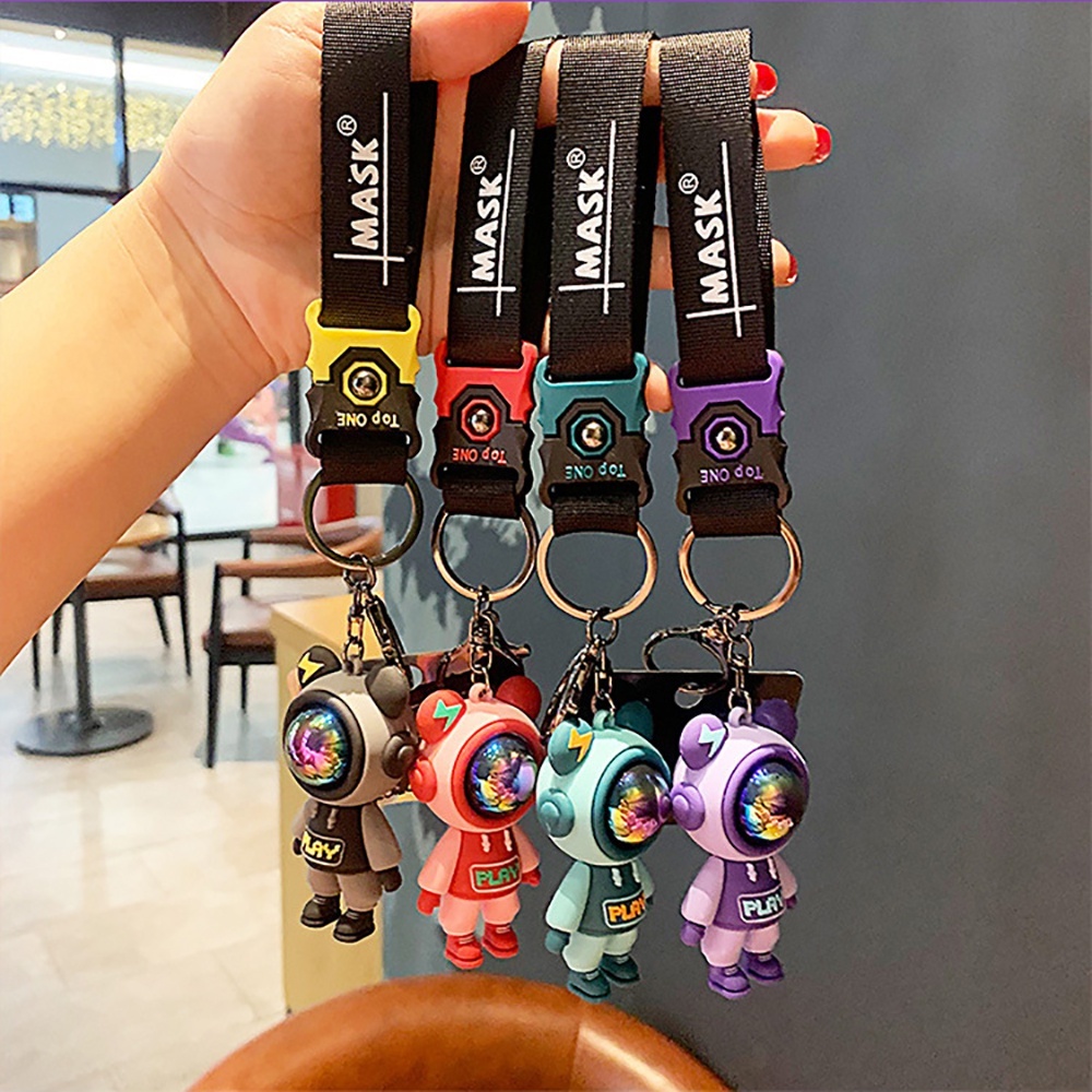 Móc khóa màu đen cute SIDOHOME phi hành gia có dây cao su thích hợp treo balo