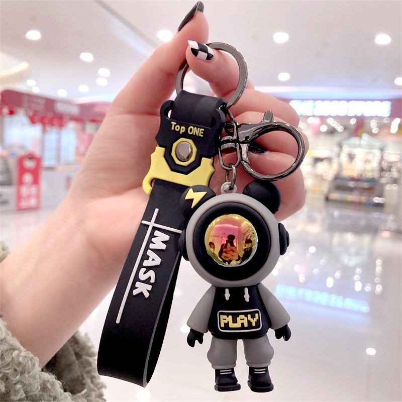 Móc khóa màu đen cute SIDOHOME phi hành gia có dây cao su thích hợp treo balo