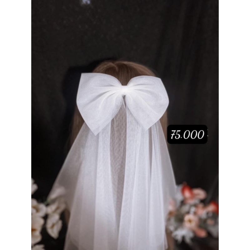 Voan lúp cô dâu chụp ảnh làm lễ