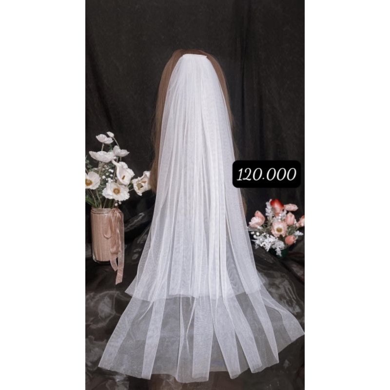 Voan lúp cô dâu chụp ảnh làm lễ