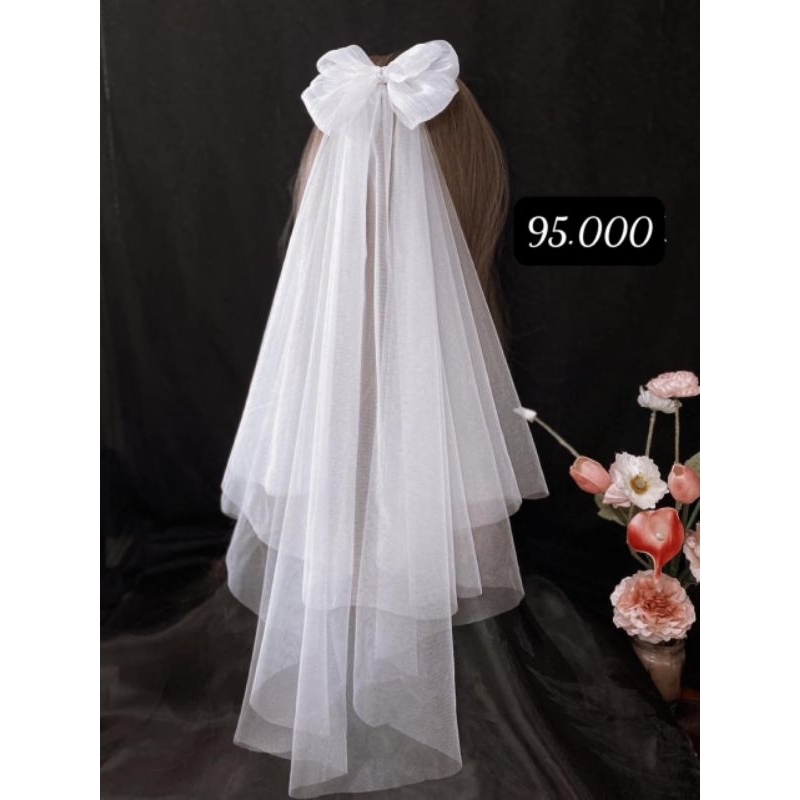 Voan lúp cô dâu chụp ảnh làm lễ