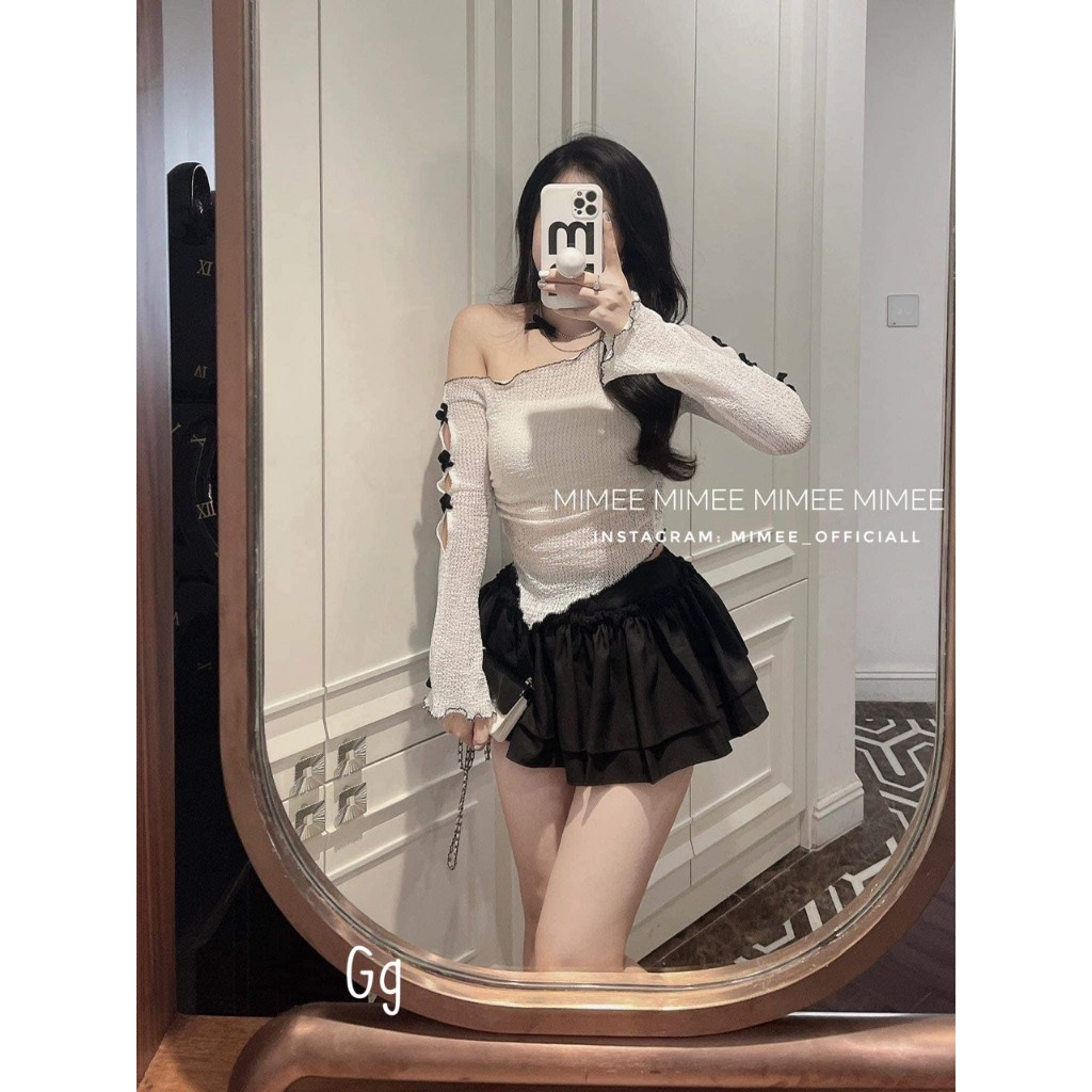 Set áo xốp lệch vai tay đính nơ xéo tà chân váy tầng