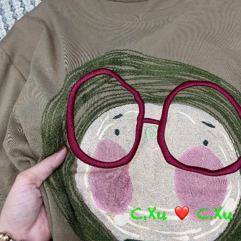 Áo phông cô bé mắt kính hàng QCL1