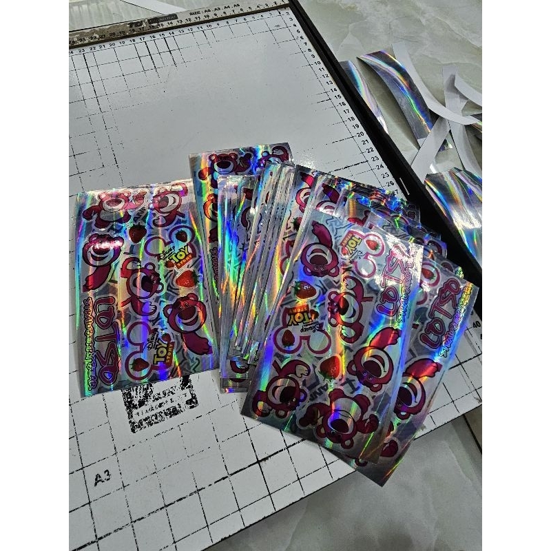 Tem logo gấu dâu lotso mini 7 màu 9x18cm dán trang trí xe máy