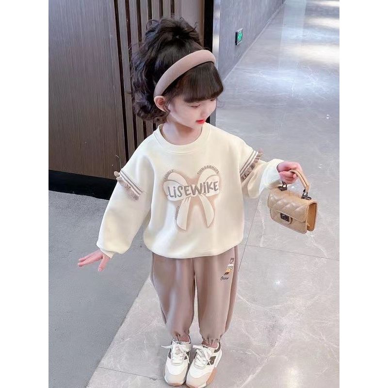 Bộ quần áo nỉ thu đông bé gái 18-55kg hình NƠ.Chất vải da cá mềm,hình in xinh xắn.BG53