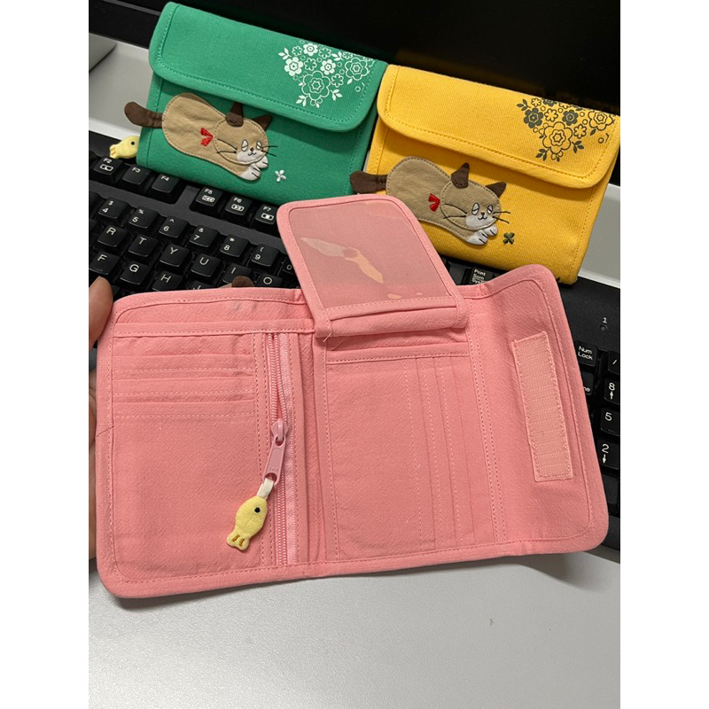 Bóp cầm tay meo meo