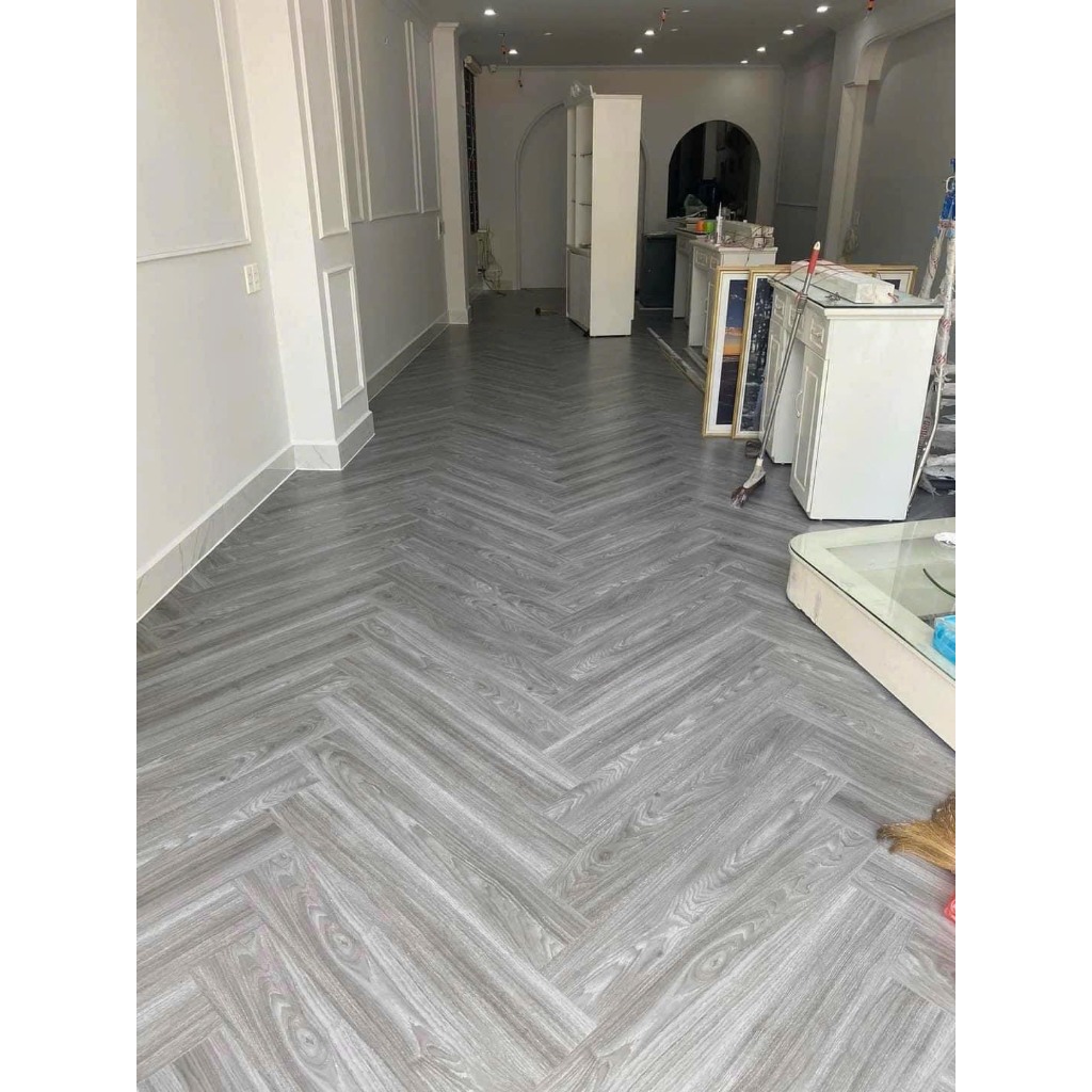 TẤM SÀN NHỰA BÓC DÁN VÂN GỖ CAO CẤP DÀY 2MM