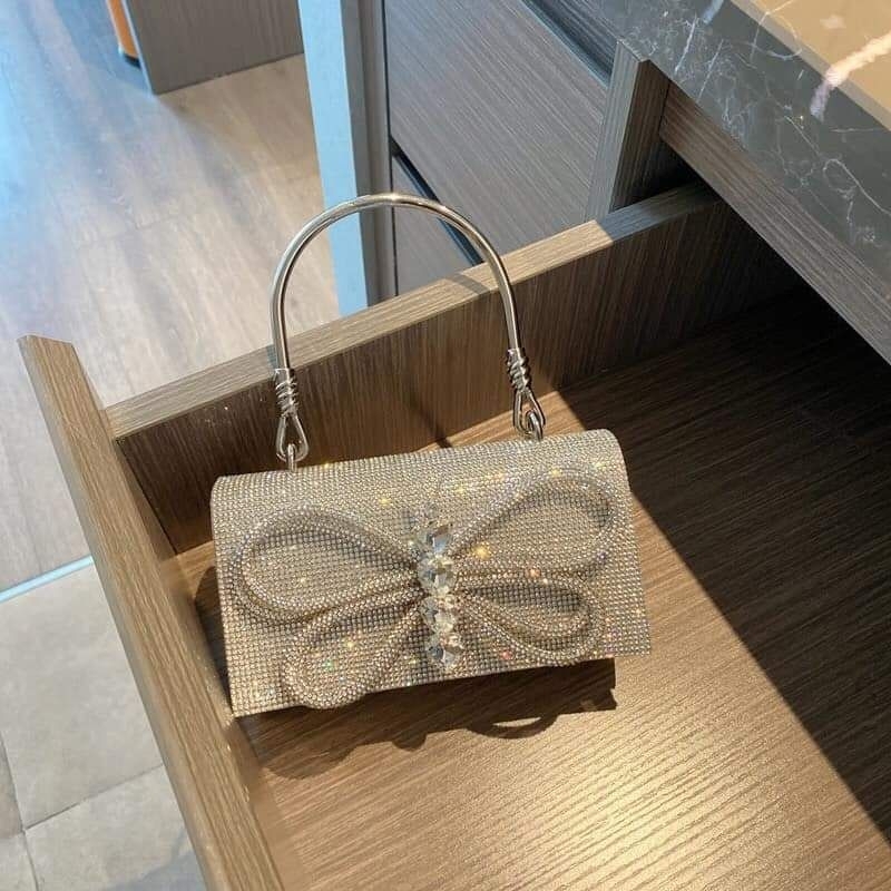 Túi ví cầm tay đi tiệc đá nơ hot hit sang chảnh 19cm