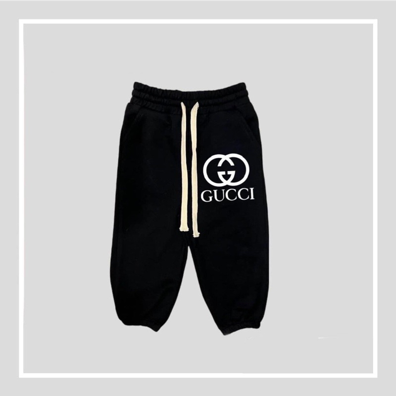 Quần nỉ joger da cá màu đen in hình logo cho bé trai bé gái size từ 12-40 cân