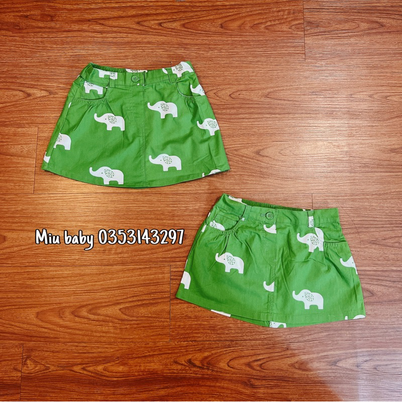 Chân váy bé gái màu xanh hoạ tiết du xin