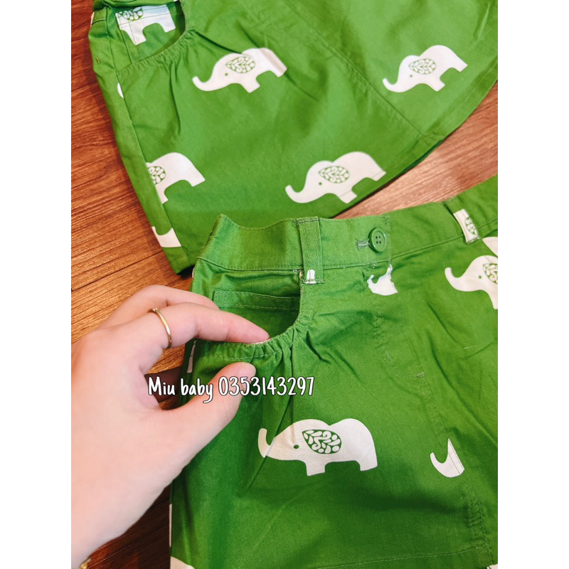 Chân váy bé gái màu xanh hoạ tiết du xin