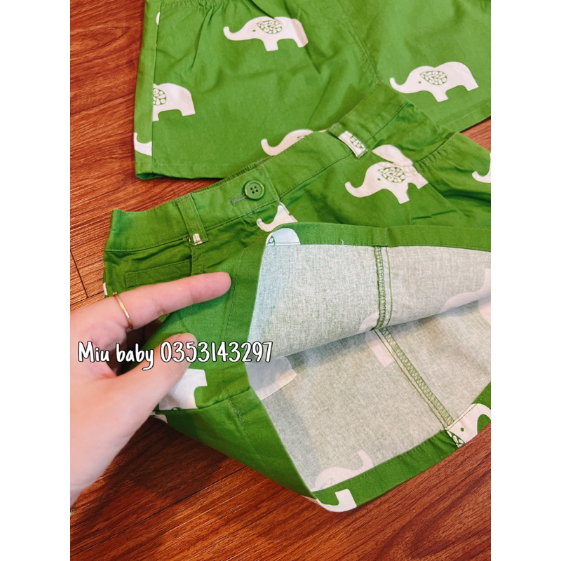 Chân váy bé gái màu xanh hoạ tiết du xin