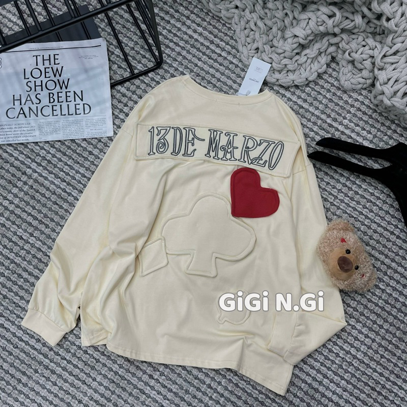 Áo nỉ 13de marzo lưng trái tim đính gấu bông