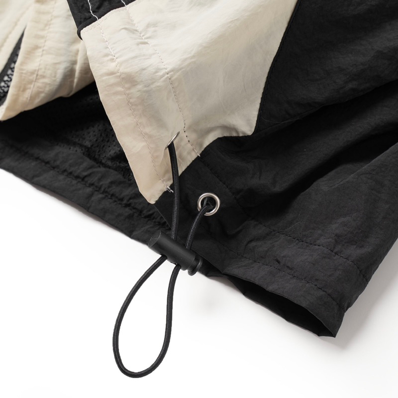 Áo khoác dù cropped chống nước 80% | MIRK21 WB jacket Black/Beige.