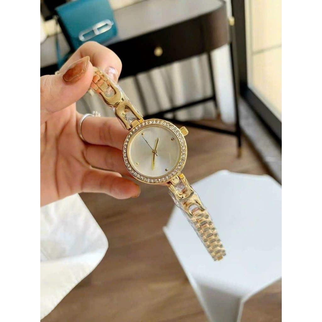 Đồng hồ nam nữ dây kim loại TB375 chống nước bảo hành