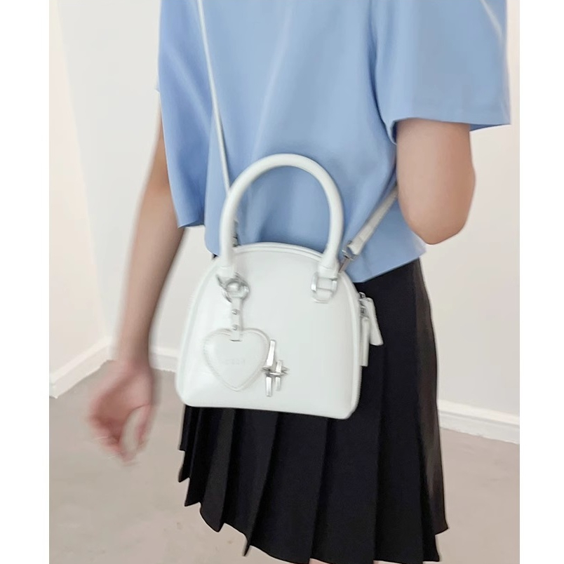 Túi xách nữ cầm tay Tuinhacam túi đeo chéo mini đựng vừa điện thoại kiểu dáng vỏ sò thời trang nữ - TNC033