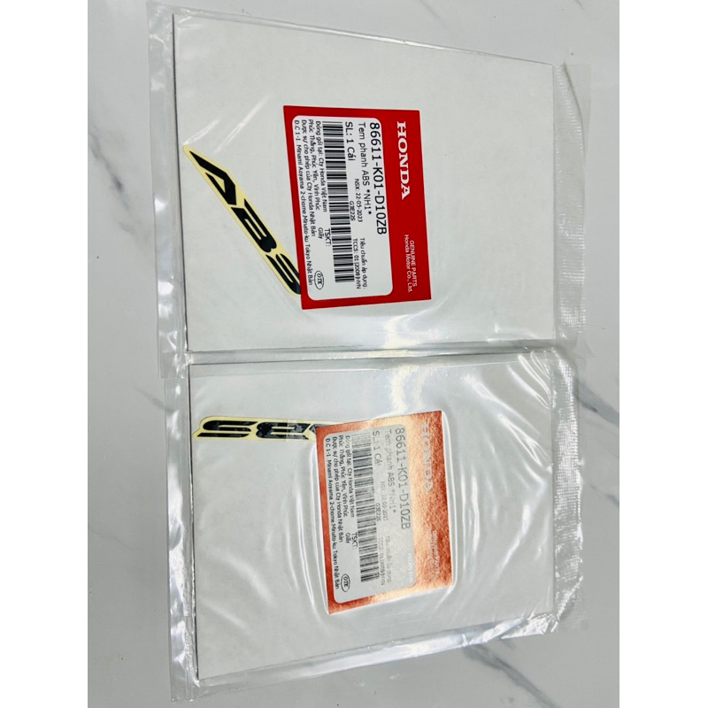 Tem dán xe chữ ABS Bạc - Đen dè trước Honda Sh Việt Nam