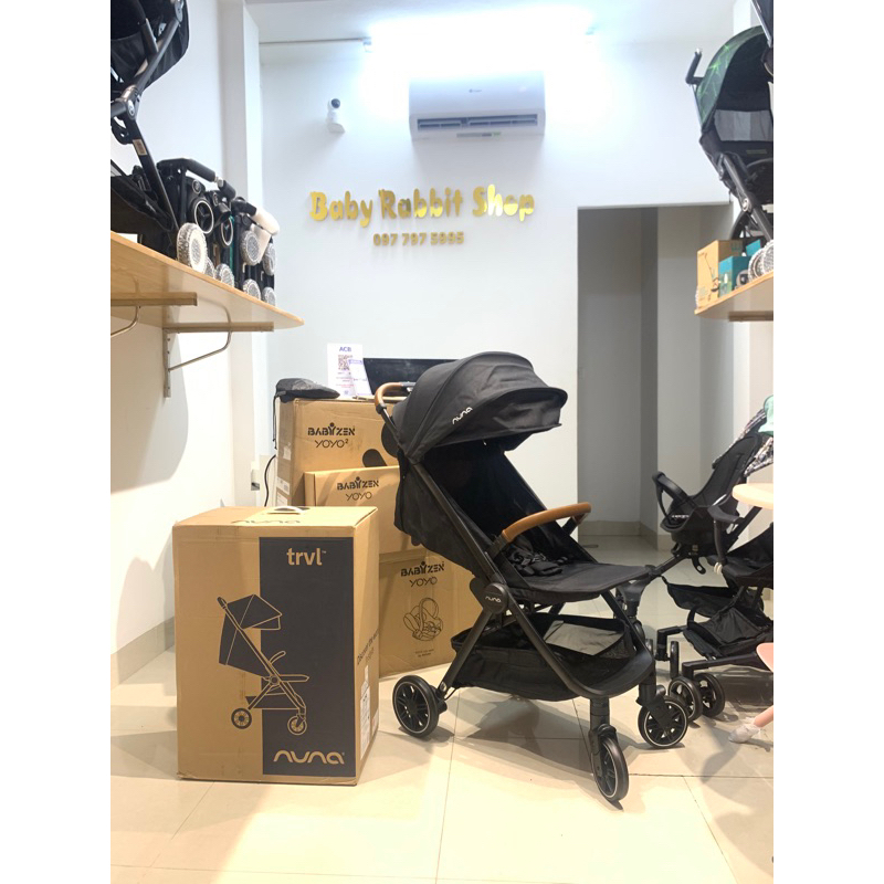 Xe đẩy du lịch gấp gọn Nuna Trvl dùng cho bé từ sơ sinh vải xe chống nước tặng kèm Rain Cover and Bag
