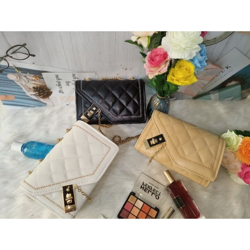 Túi xách nữ khóa chéo 3 ngăn giá rẻ thời trang hot trend siêu xinh