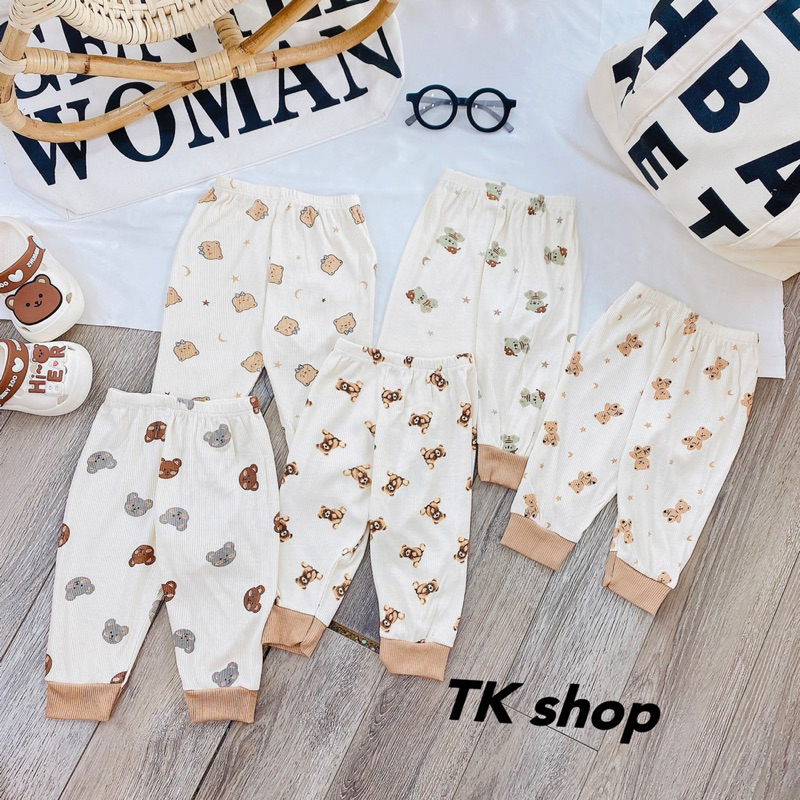 Quần dài thun tăm nền kem hoa văn