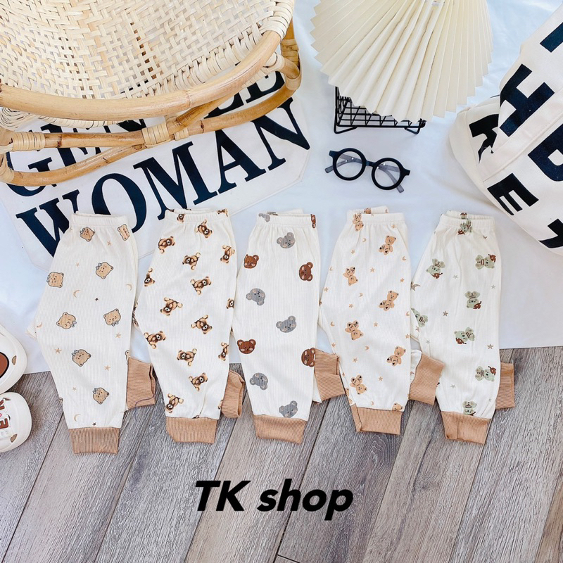 Quần dài thun tăm nền kem hoa văn